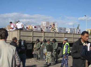 Palestinian trucks lined at Rafah crossing under Egyptian
