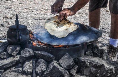 Bedouin flatbread liba baked on coals Israel