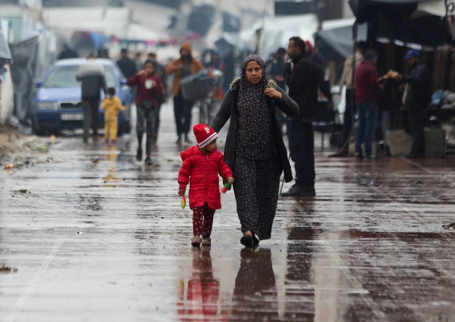 Gaza City displaced civilians rainy