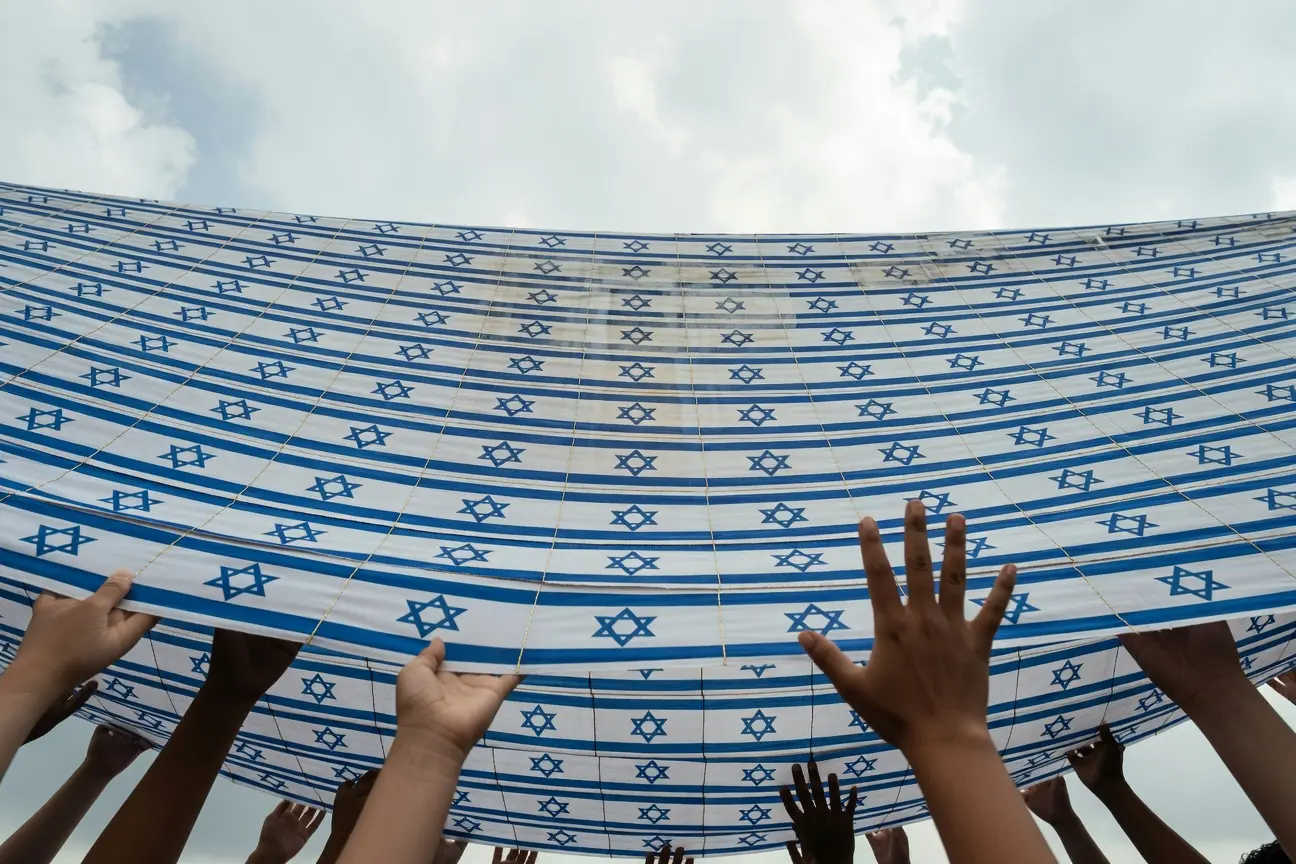 Israeli artist Tal Tenne Czaczkes Flag of Flags canopy unity project nationwide tour.